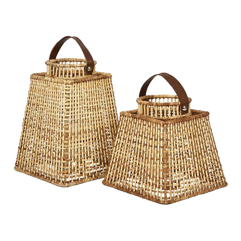 Two woven baskets with handles on a light gray background