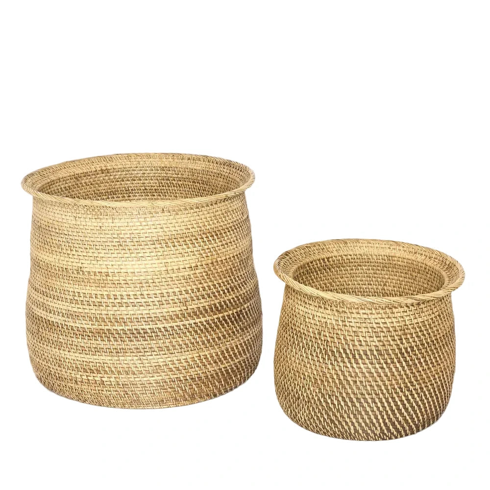 Two woven baskets on a light gray background