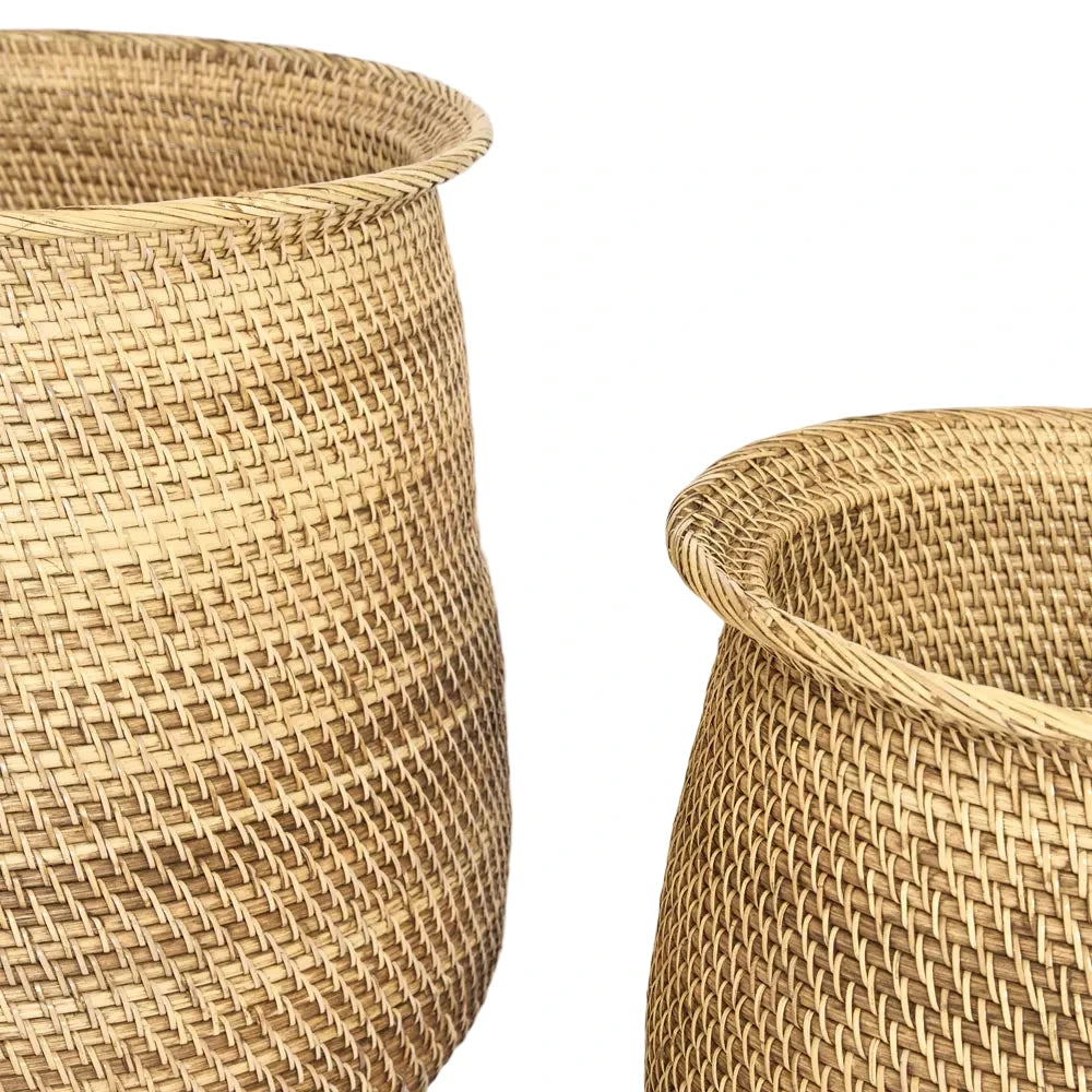 Two woven baskets on a light gray background