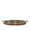 Round metal tray with brown leather rim on a white background