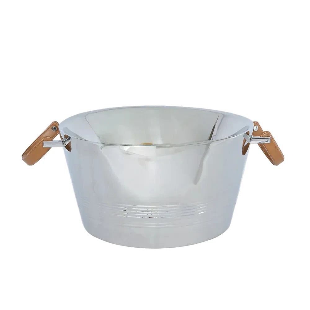 Metallic bowl with wooden handles on a light gray background