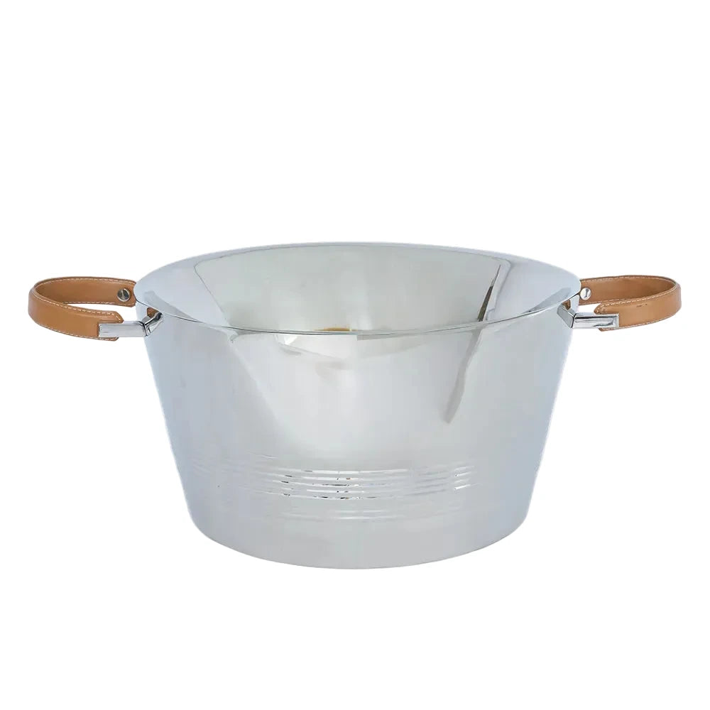 Metallic bowl with leather handles on a white background