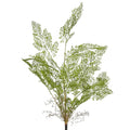 Artificial green plant branch on a light gray background