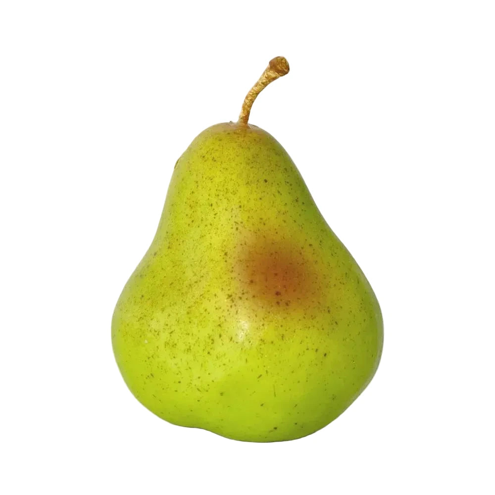 Green pear with a brown spot on a white background