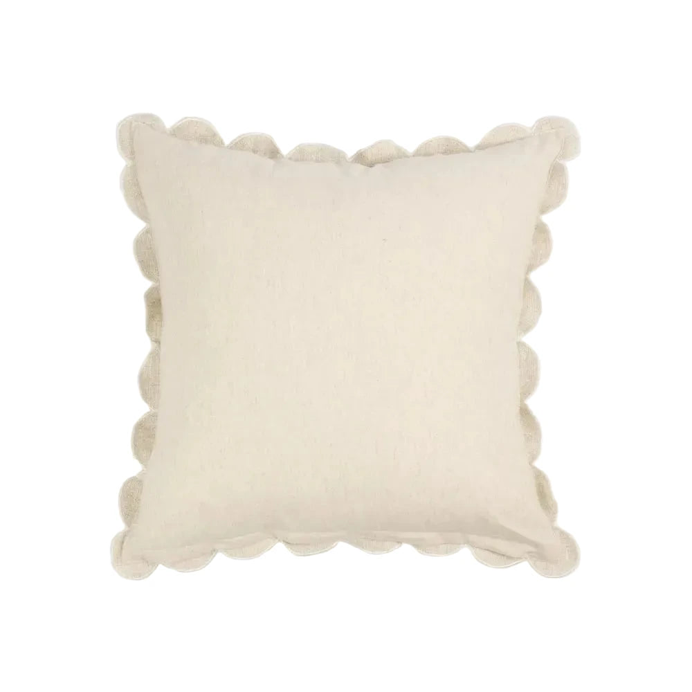 Beige pillow with textured trim on a white background