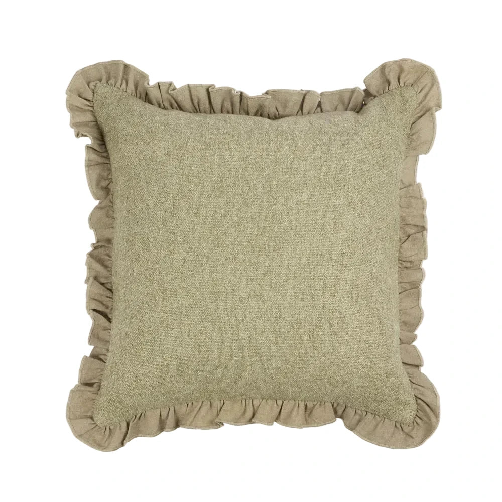 Green cushion with ruffled edges on a white background