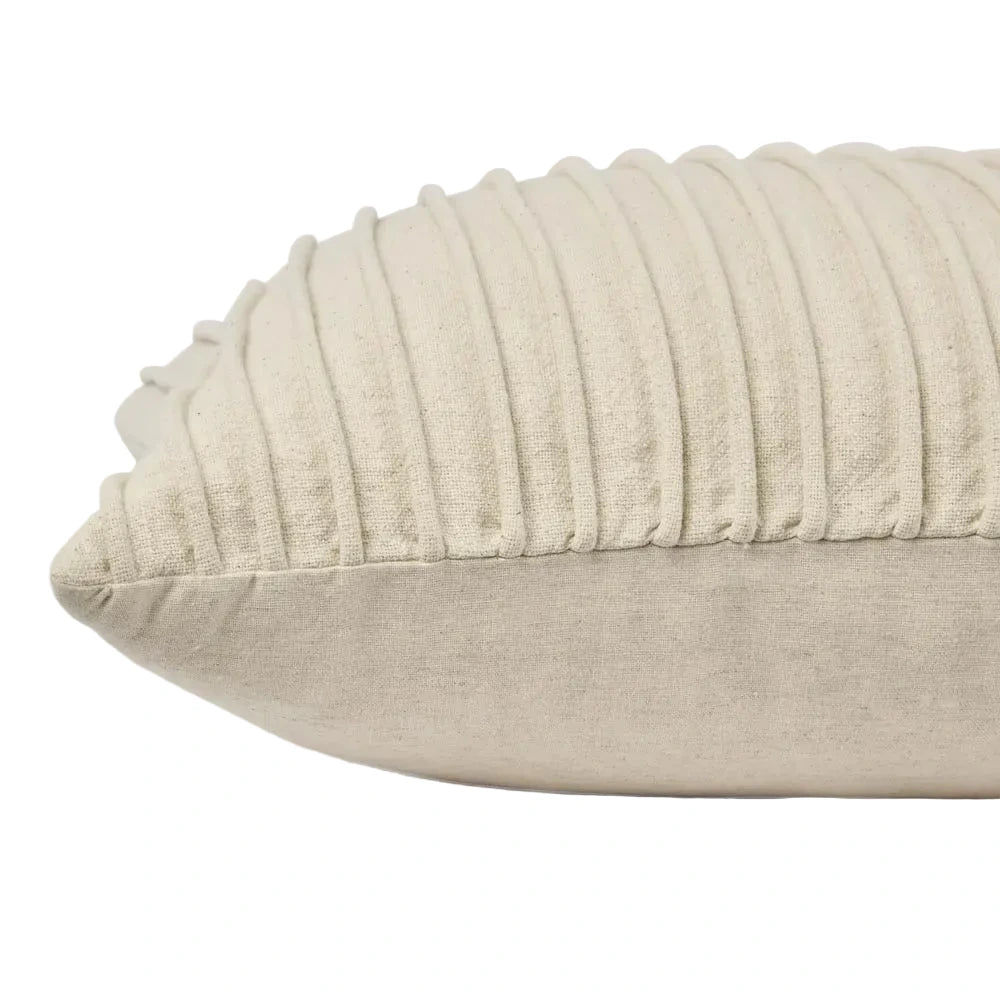 Beige textured pillow on a white background