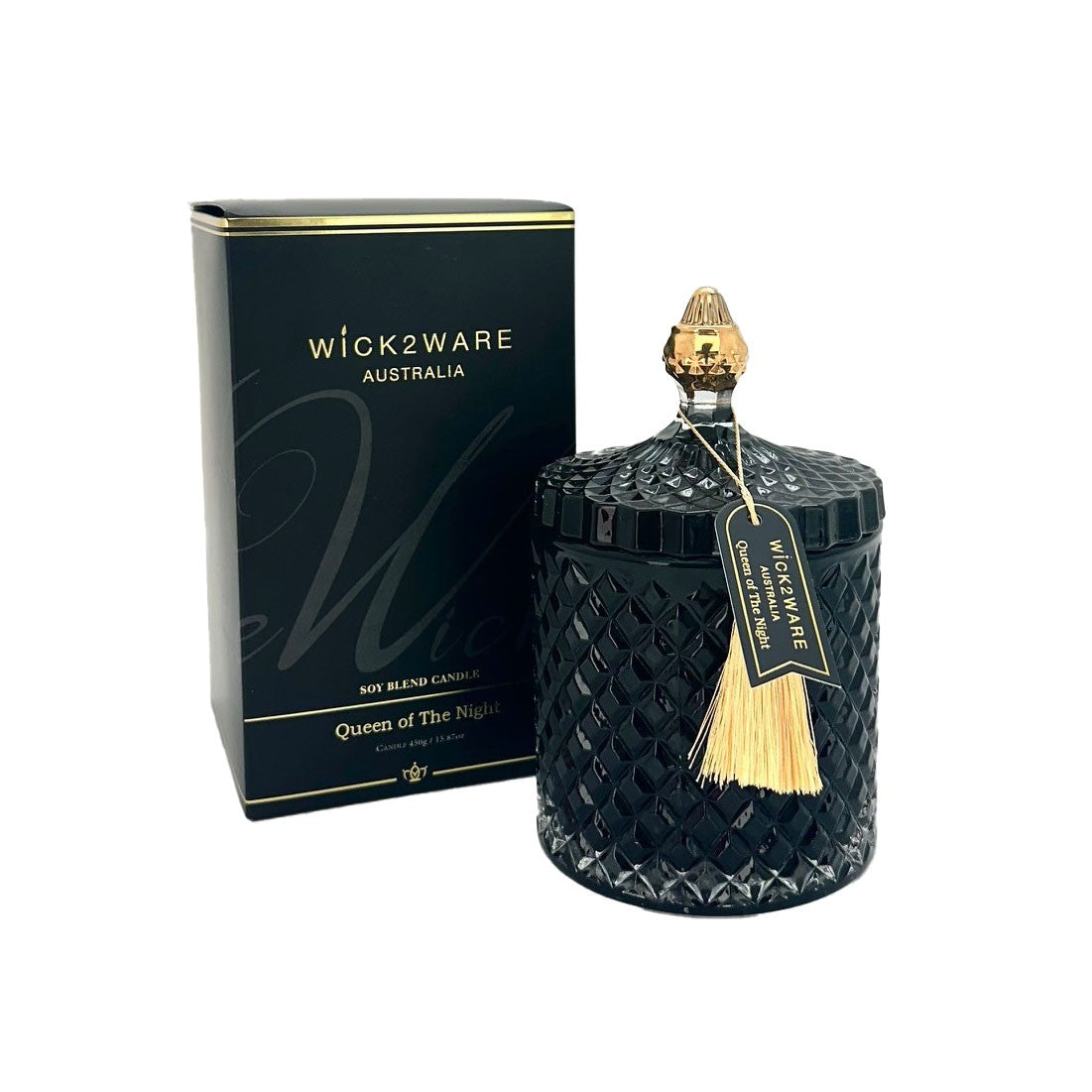 Black candle with decorative lid and tassel next to a black box labeled 'Wick2ware Australia' on a white background.