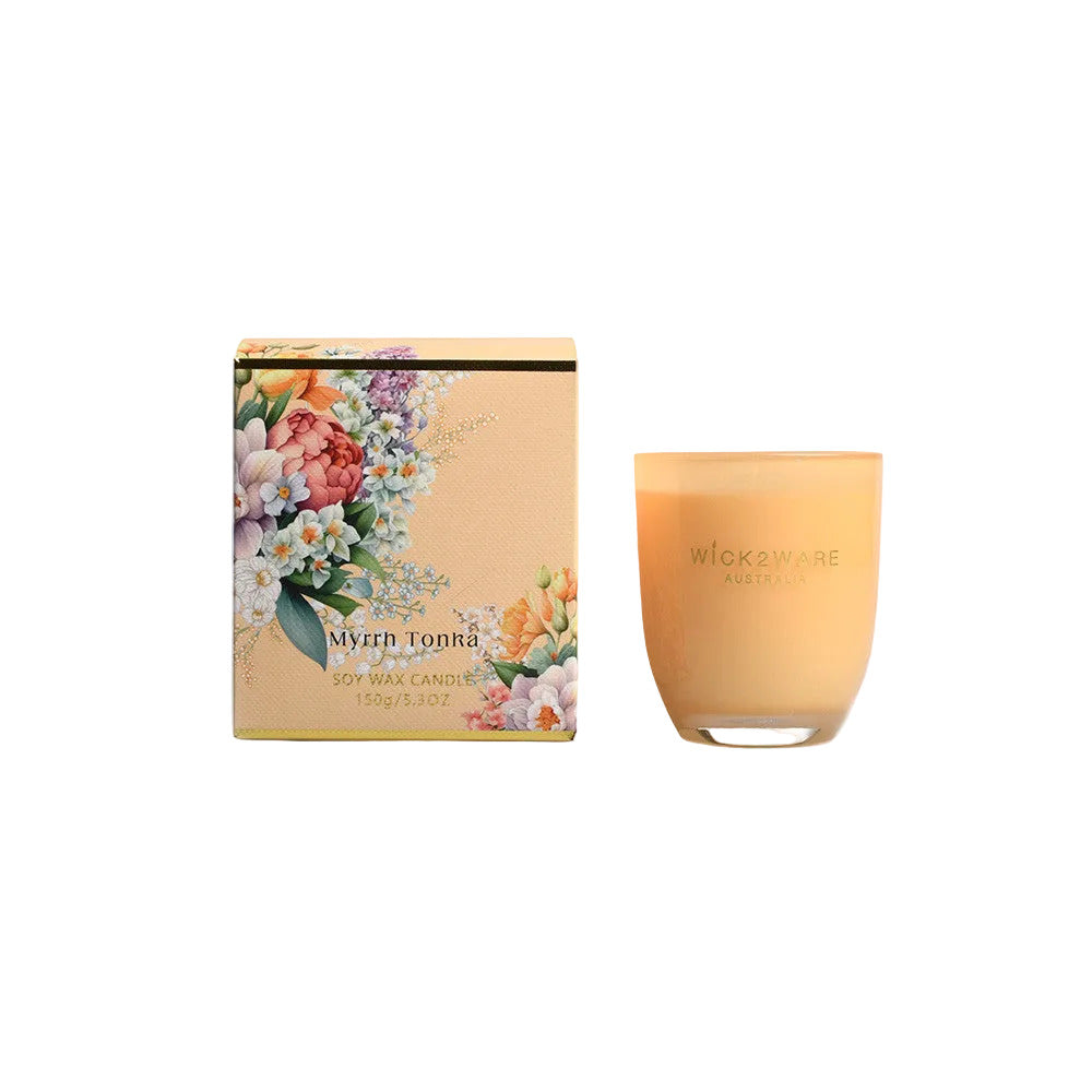 Wick & Ware candle with floral packaging on a white background