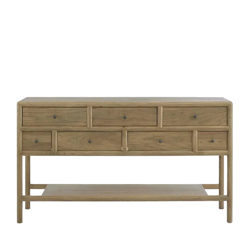 Wooden console table with multiple drawers on a white background