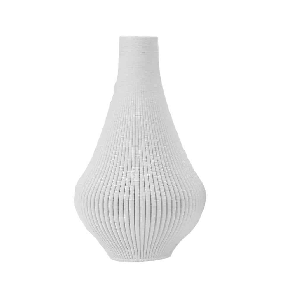 White ribbed vase on a light gray background