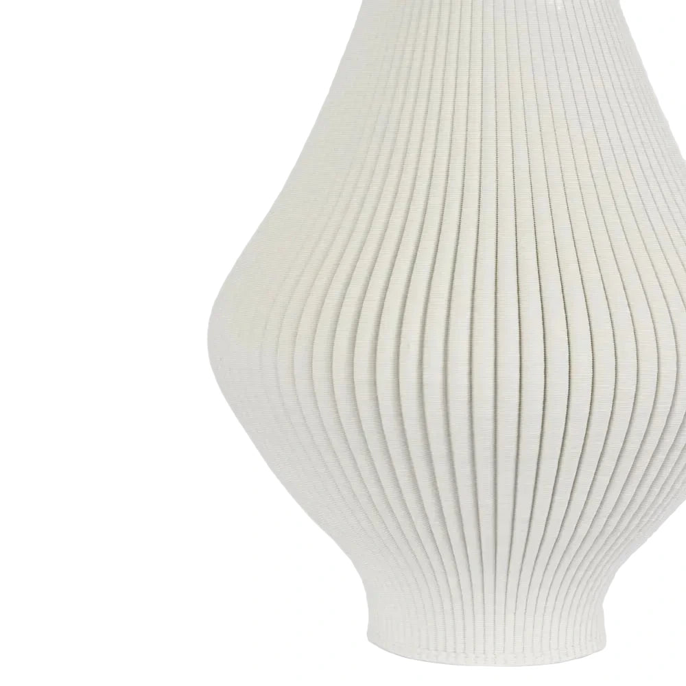 White ribbed vase on a light gray background
