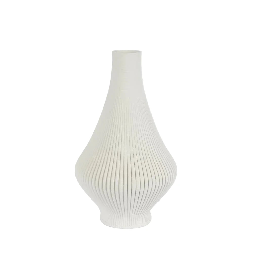White ribbed vase on a light gray background