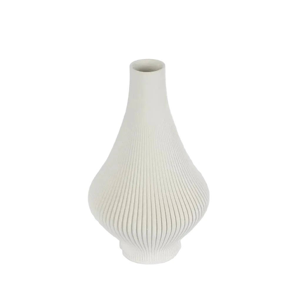 White ribbed vase on a light gray background
