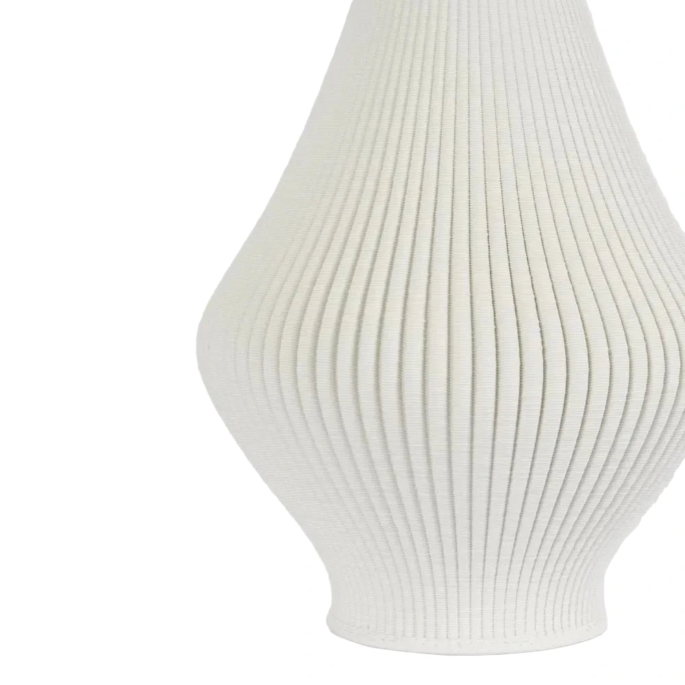 White ribbed vase on a light gray background