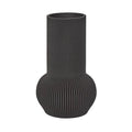 Black ribbed vase on a light gray background