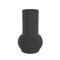 Black ribbed vase on a light gray background