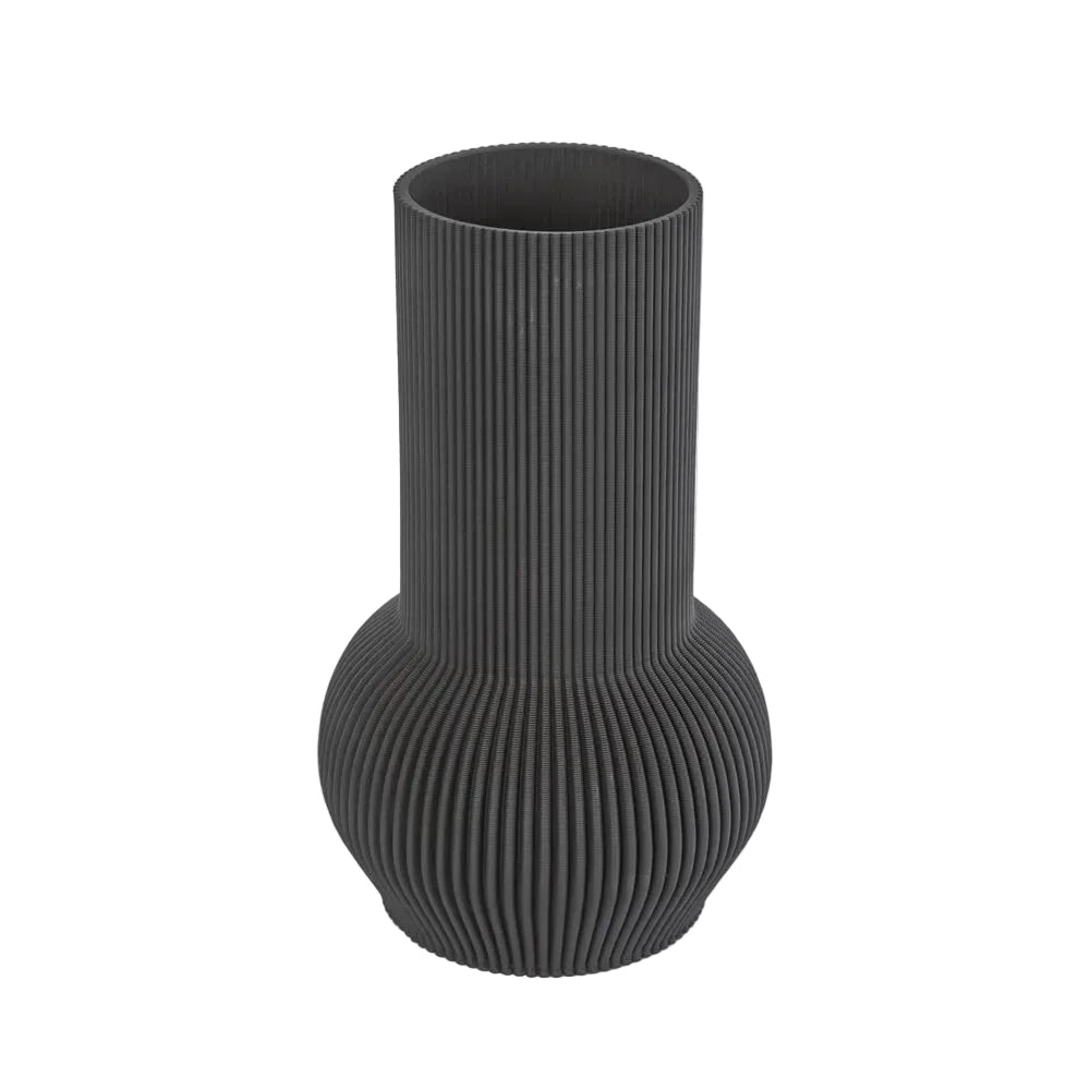 Black ribbed vase on a light gray background