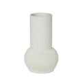 White ribbed vase on a light gray background