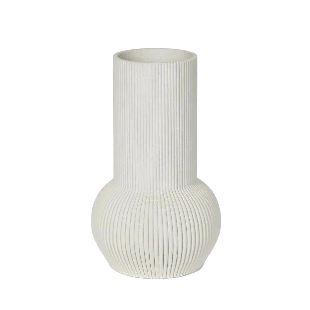 White ribbed vase on a light gray background