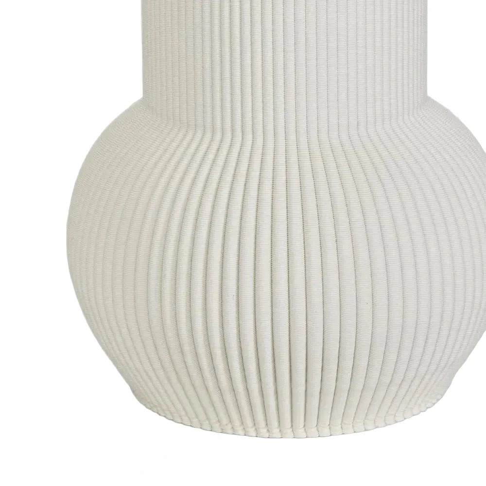 White ribbed vase on a light gray background