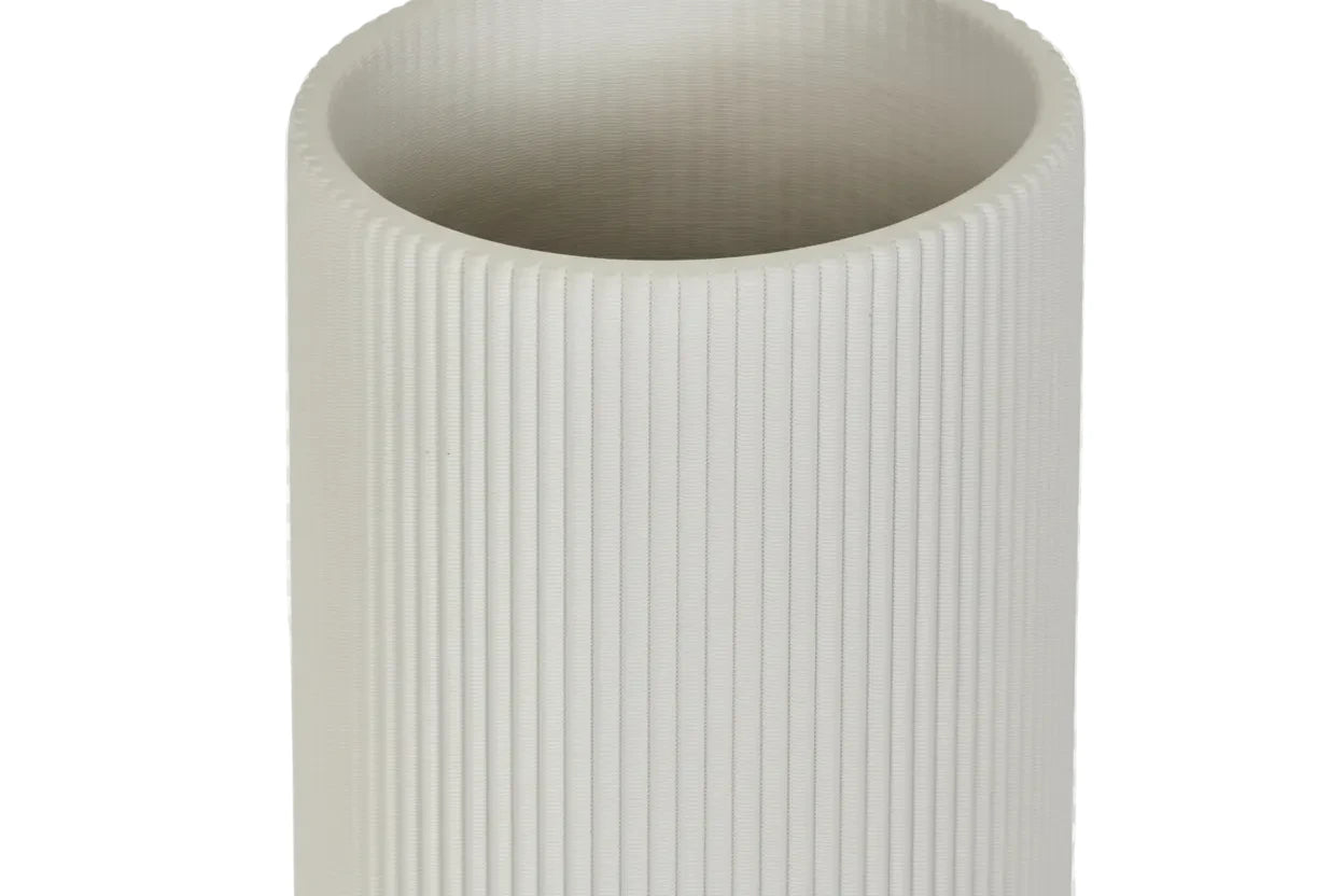 Close-up of a textured cylindrical object on a white background